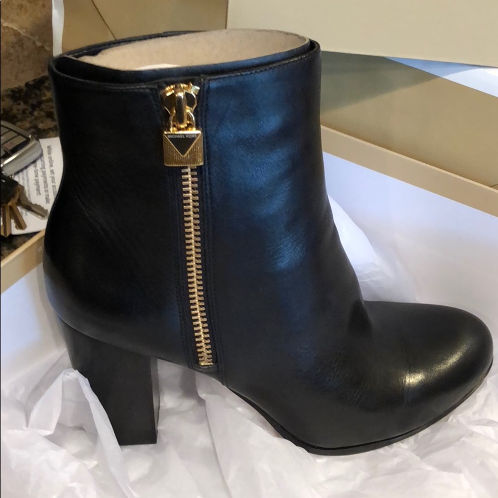 Michael Kors new with box and bag.
